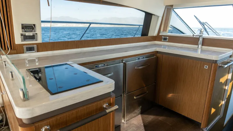 O-sea-d Yacht Photos Pics Luxurious kitchen interior of 2017 Sea Ray 51 Flybridge yacht with modern appliances.