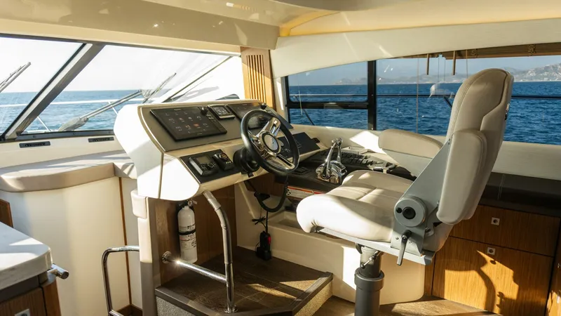 O-sea-d Yacht Photos Pics 2017 Sea Ray 51 Flybridge helm with modern controls and ocean view.
