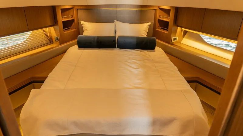 O-sea-d Yacht Photos Pics Luxurious bedroom interior of 2017 Sea Ray 51 Flybridge yacht with elegant bedding.