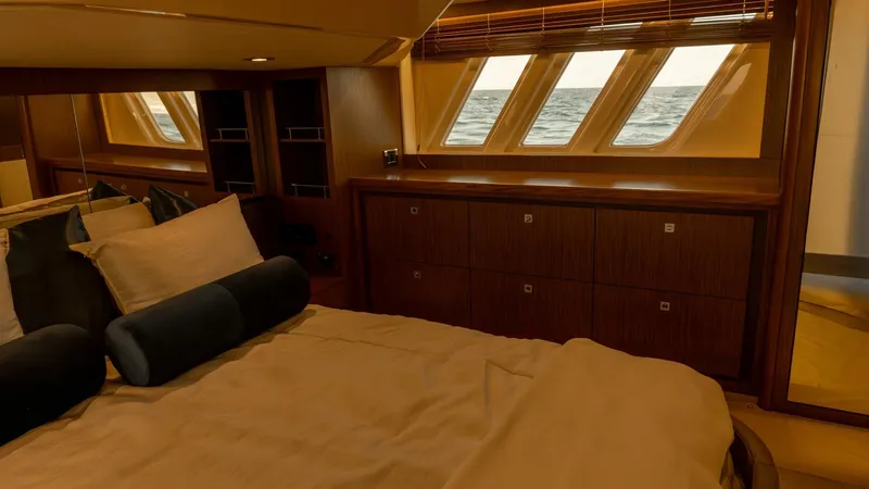 O-sea-d Yacht Photos Pics Luxurious bedroom interior of 2017 Sea Ray 51 Flybridge yacht with ocean view.