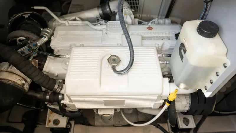 O-sea-d Yacht Photos Pics Engine compartment of a 2017 Sea Ray 51 Flybridge yacht, showcasing mechanical components.