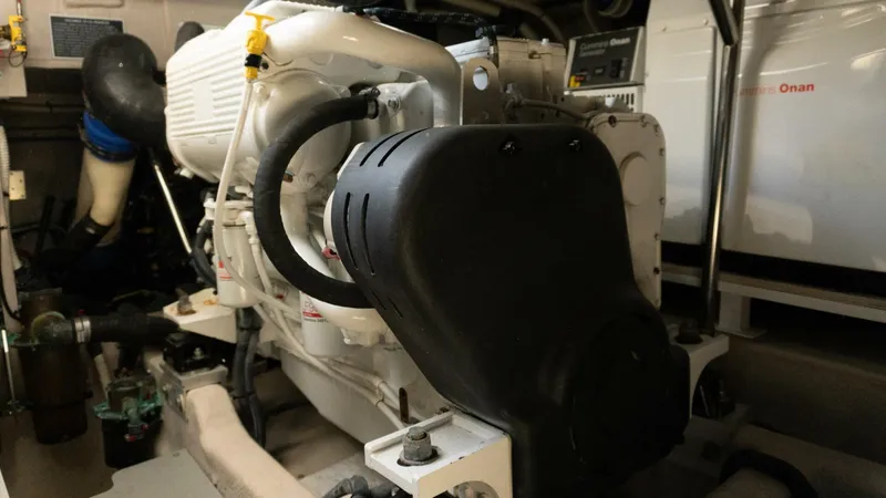 O-sea-d Yacht Photos Pics Engine room of 2017 Sea Ray 51 Flybridge yacht, showcasing mechanical components.