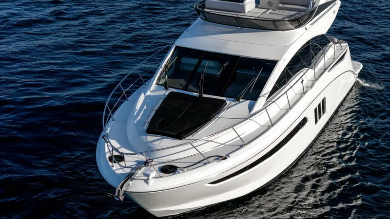 O-sea-d Yacht Photos Pics 2017 Sea Ray 51 Flybridge yacht cruising on open water.