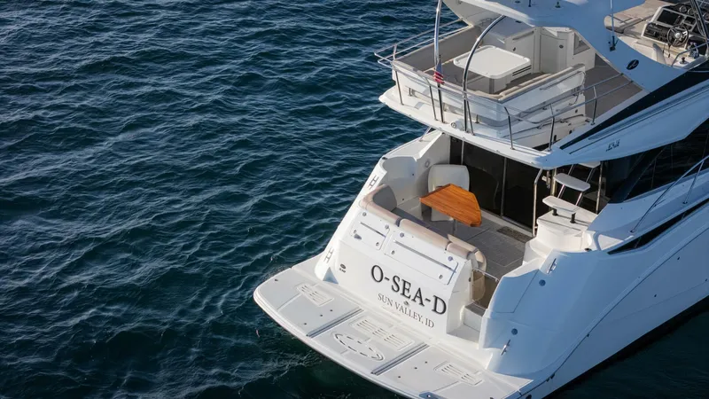 O-sea-d Yacht Photos Pics 2017 Sea Ray 51 Flybridge yacht on open water, rear view.