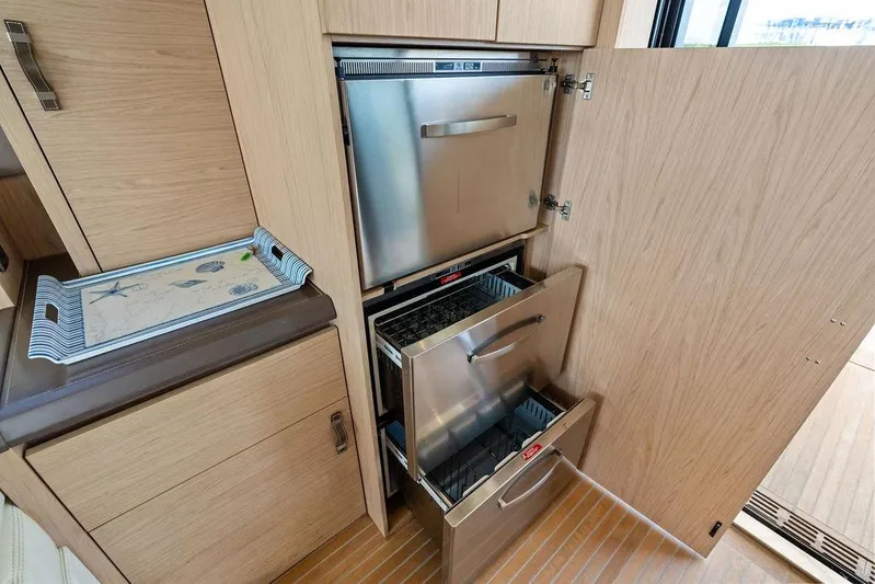  Yacht Photos Pics Modern kitchen area in 2018 Monte Carlo MC 35 yacht with stainless steel appliances.