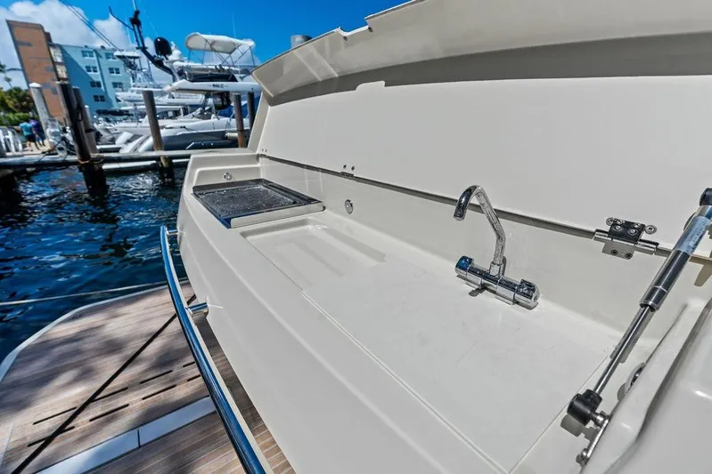  Yacht Photos Pics Outdoor sink on 2018 Monte Carlo MC 35 yacht, docked at marina.