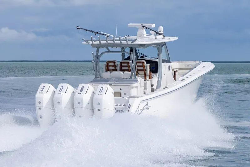 Big B Yacht Photos Pics 2024 Blackwater 43 Sportfish boat cruising on open water with powerful engines.