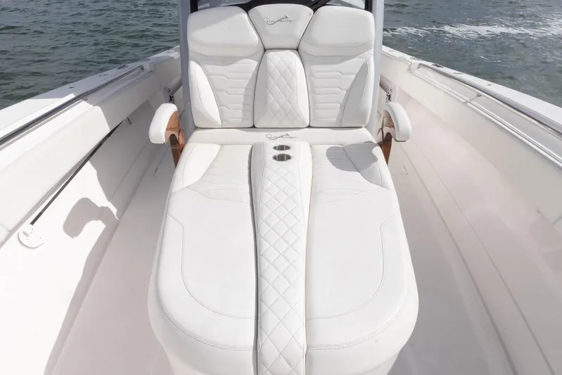 Big B Yacht Photos Pics Luxurious seating on 2024 Blackwater 43 Sportfish boat, featuring elegant white upholstery.