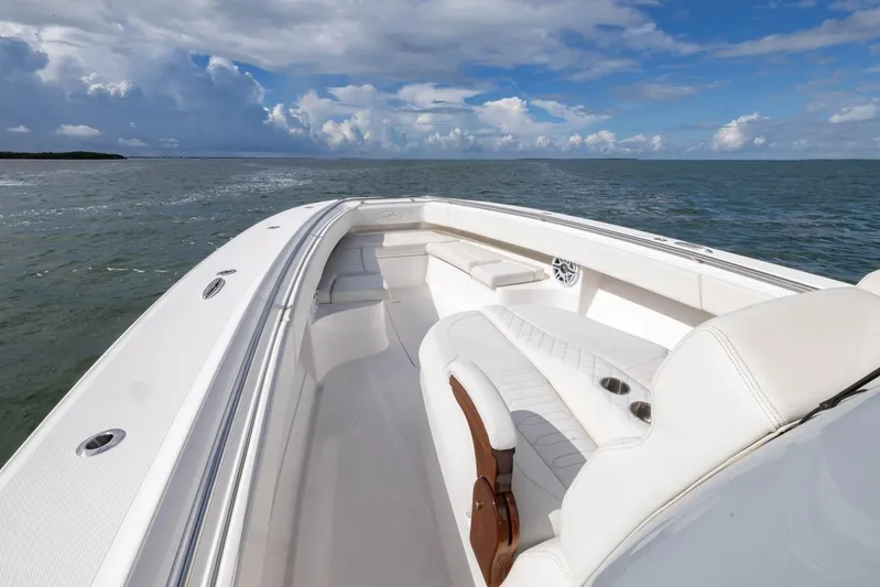 Big B Yacht Photos Pics 2024 Blackwater 43 Sportfish boat with luxurious white seating on open water.