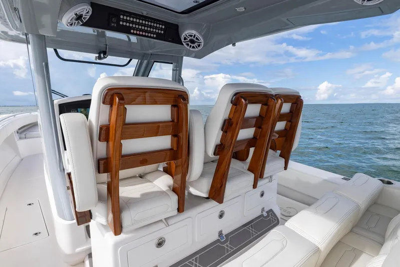 Big B Yacht Photos Pics 2024 Blackwater 43 Sportfish boat interior with luxurious seating and ocean view.