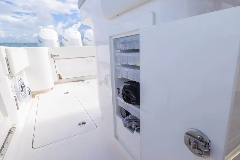 Big B Yacht Photos Pics 2024 Blackwater 43 Sportfish boat interior with storage compartments and Mercury engines.