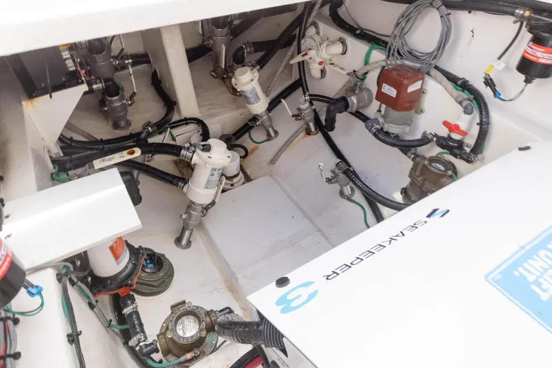 Big B Yacht Photos Pics Engine compartment of 2024 Blackwater 43 Sportfish, showcasing mechanical components and wiring.