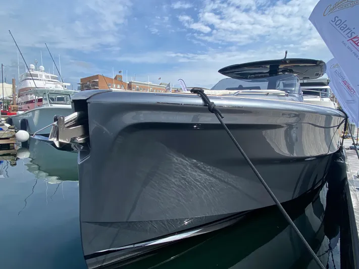  Yacht Photos Pics 2024 Solaris Power 40F Open yacht docked, showcasing sleek design and modern features.