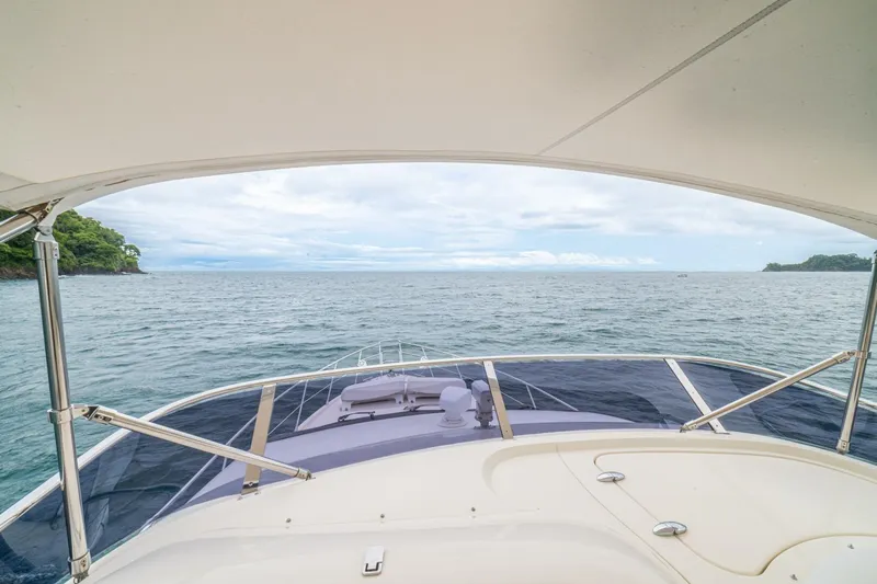 Hakuna Matata Yacht Photos Pics View from 2007 Azimut 55 yacht, overlooking serene ocean and distant islands.