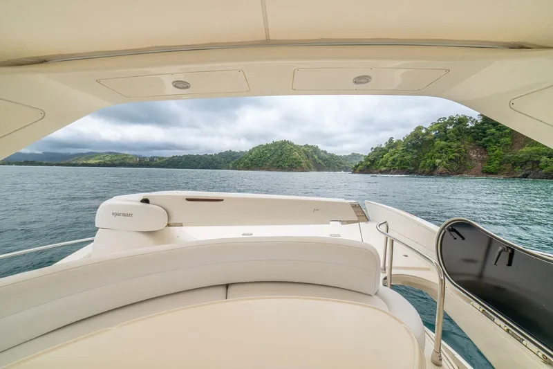 Hakuna Matata Yacht Photos Pics Luxurious 2007 Azimut 55 yacht with scenic ocean and island view.