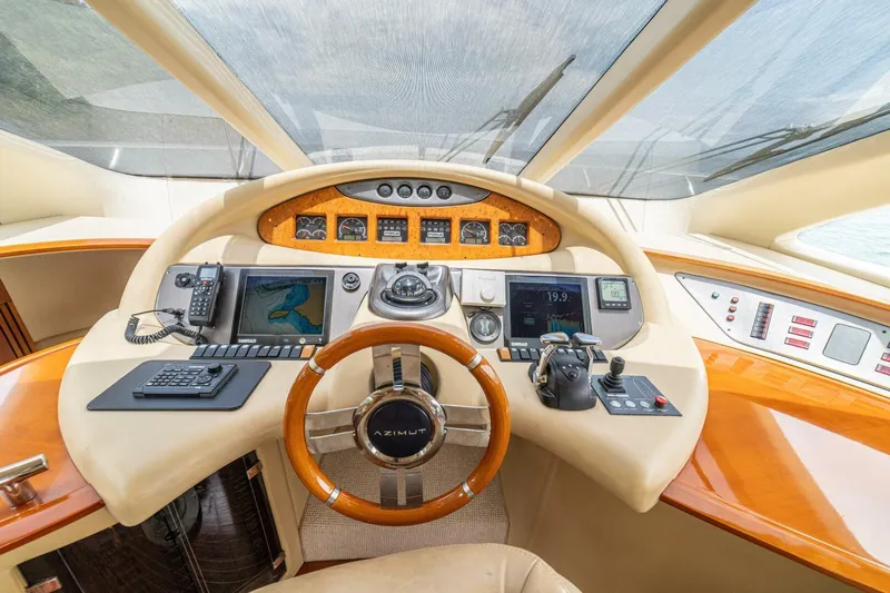 Hakuna Matata Yacht Photos Pics Cockpit of 2007 Azimut 55 yacht with advanced navigation and control systems.