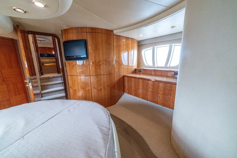 Hakuna Matata Yacht Photos Pics Luxurious interior of 2007 Azimut 55 yacht with wood paneling and modern amenities.