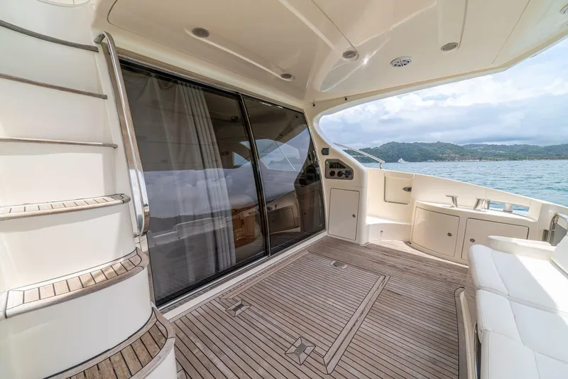 Hakuna Matata Yacht Photos Pics Luxurious 2007 Azimut 55 yacht deck with scenic ocean view.