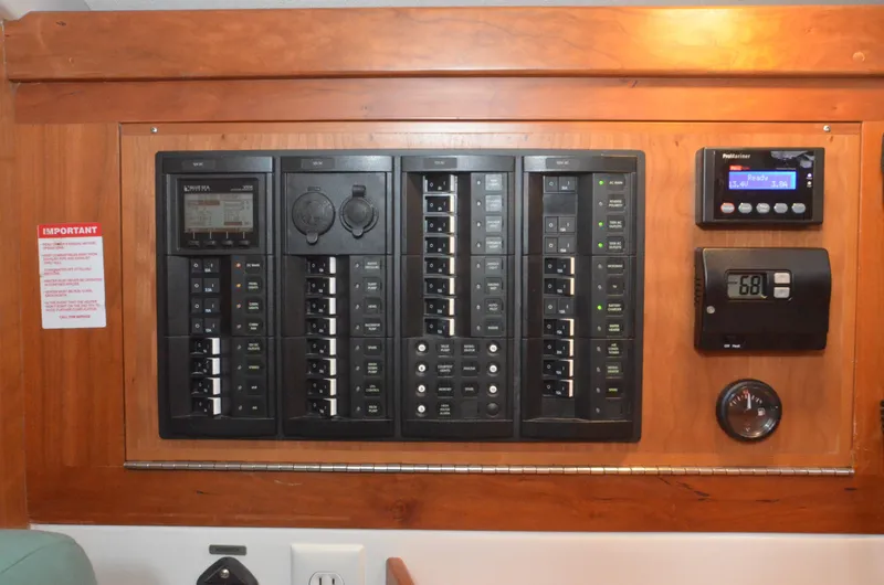 Tahlequah Yacht Photos Pics Electrical control panel on a 2020 Tartan 365 yacht, featuring various switches and displays.