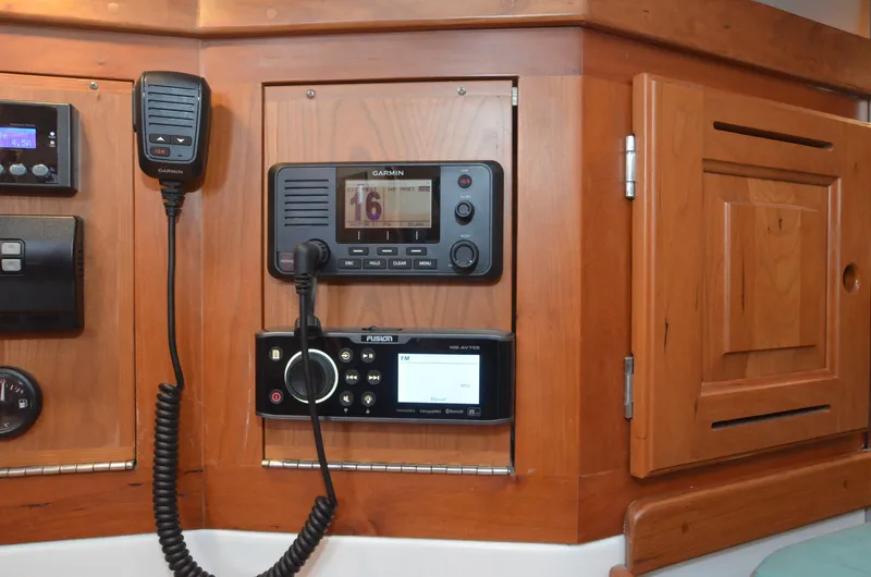 Tahlequah Yacht Photos Pics Control panel with Garmin and Fusion devices on a Tartan 365 yacht, 2020 model.