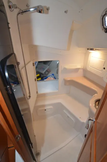 Tahlequah Yacht Photos Pics Compact bathroom in 2020 Tartan 365 yacht with shower and storage.