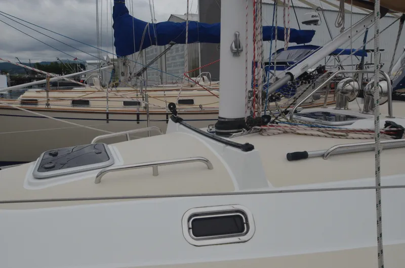Tahlequah Yacht Photos Pics Sailboat deck of 2020 Tartan 365 with rigging and hatches in marina setting.