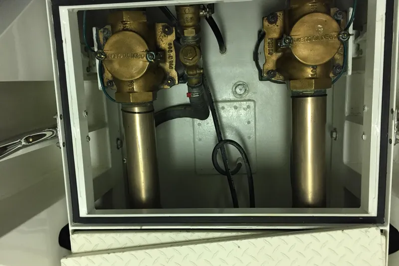 Front Row Yacht Photos Pics 2006 NorthCoast PILOTHOUSE engine compartment with brass components and wiring.