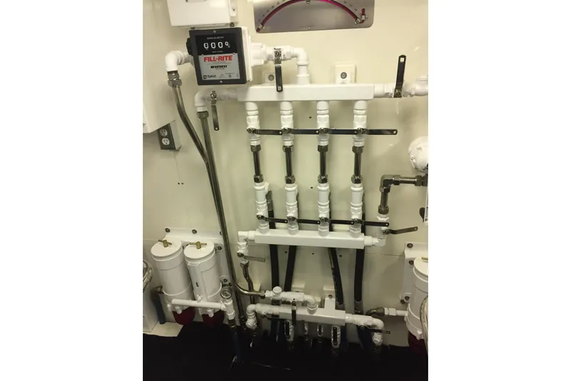 Front Row Yacht Photos Pics Engine room piping system in a 2006 NorthCoast PILOTHOUSE boat.