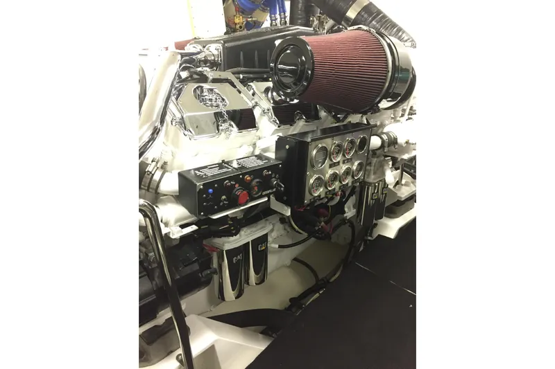 Front Row Yacht Photos Pics Engine room of 2006 NorthCoast PILOTHOUSE with detailed gauges and components.