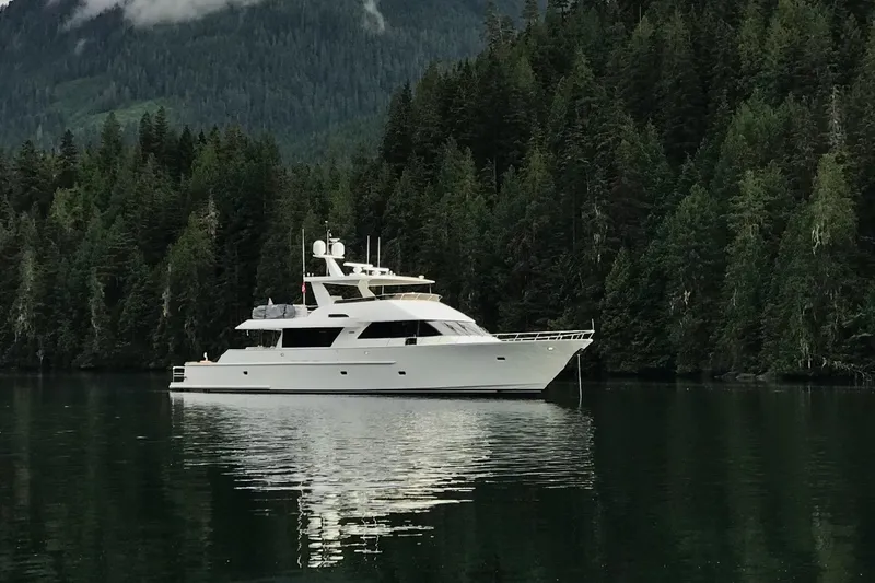 Front Row Yacht Photos Pics 2006 NorthCoast PILOTHOUSE yacht on serene forested lake.