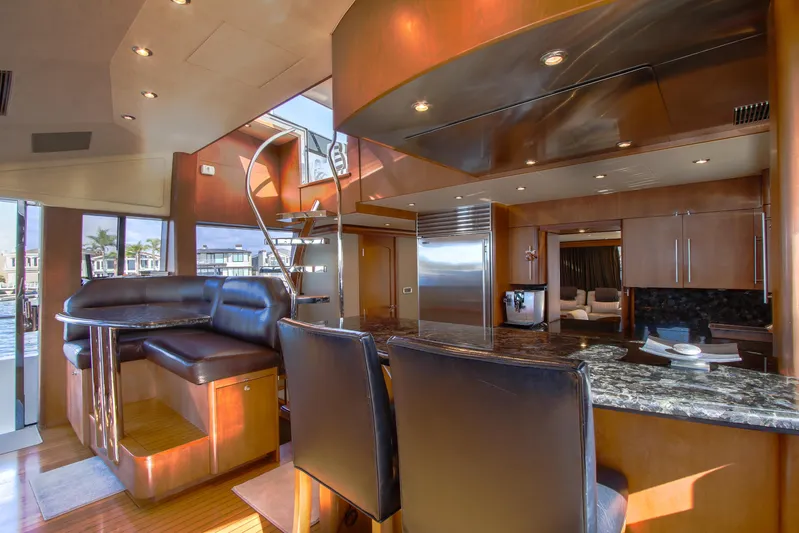 Front Row Yacht Photos Pics Luxurious 2006 Northcoast Yachts Yachtfisher interior with modern kitchen and seating area.