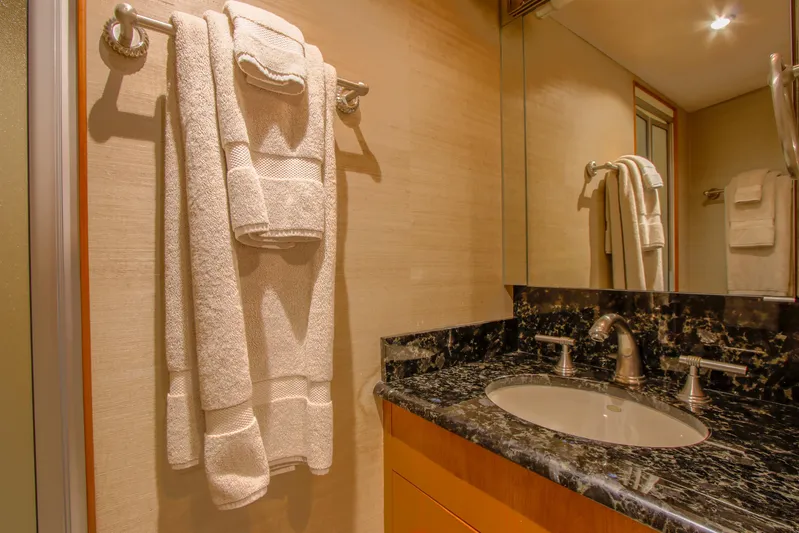 Front Row Yacht Photos Pics Luxurious bathroom in 2006 Northcoast Yachts Yachtfisher with elegant marble countertop.