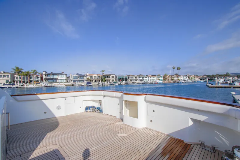 Front Row Yacht Photos Pics 2006 Northcoast Yachts Yachtfisher deck with waterfront view and clear blue sky.