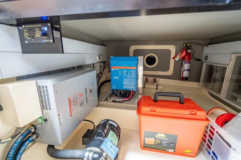 Stella Yacht Photos Pics Engine room of 2018 Palm Beach Motor Yachts PB50 with equipment and safety gear.