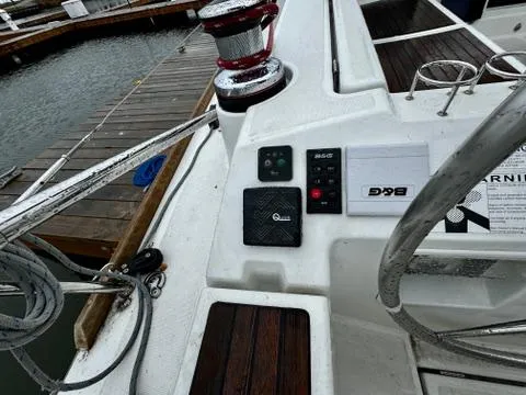  Yacht Photos Pics Cockpit controls of a 2018 Beneteau Oceanis 45 sailboat at a marina.