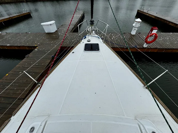  Yacht Photos Pics Bow view of 2018 Beneteau Oceanis 45 docked at a marina.