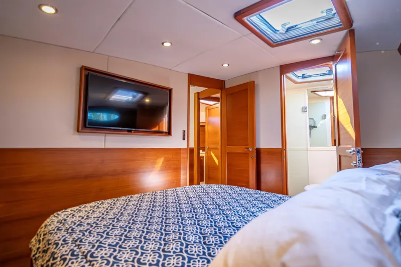 Eleven11 Yacht Photos Pics Luxurious cabin interior of 2018 Palm Beach Motor Yachts PB55 with modern amenities.