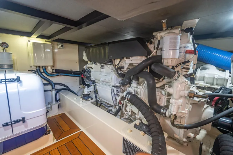 Eleven11 Yacht Photos Pics Engine room of 2018 Palm Beach Motor Yachts PB55, showcasing mechanical components and systems.