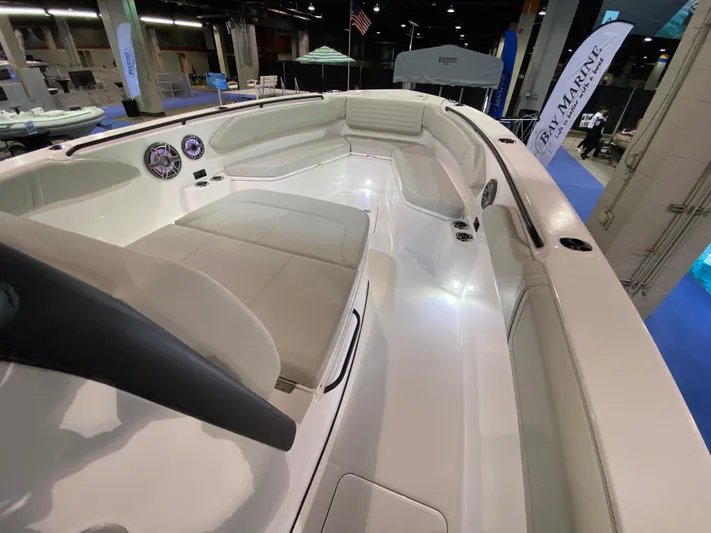  Yacht Photos Pics 2025 Edgewater 340CC boat interior with sleek seating and modern design at a boat show.
