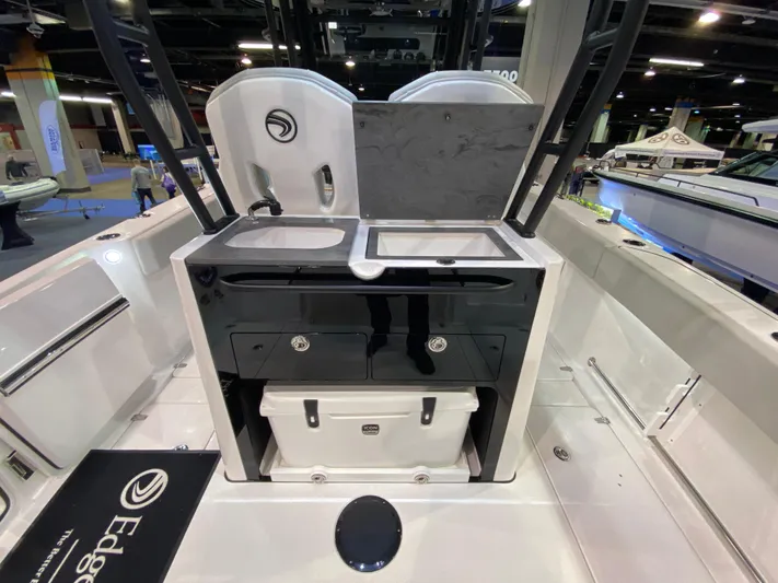  Yacht Photos Pics 2025 Edgewater 340CC boat interior with dual sinks and storage compartments.