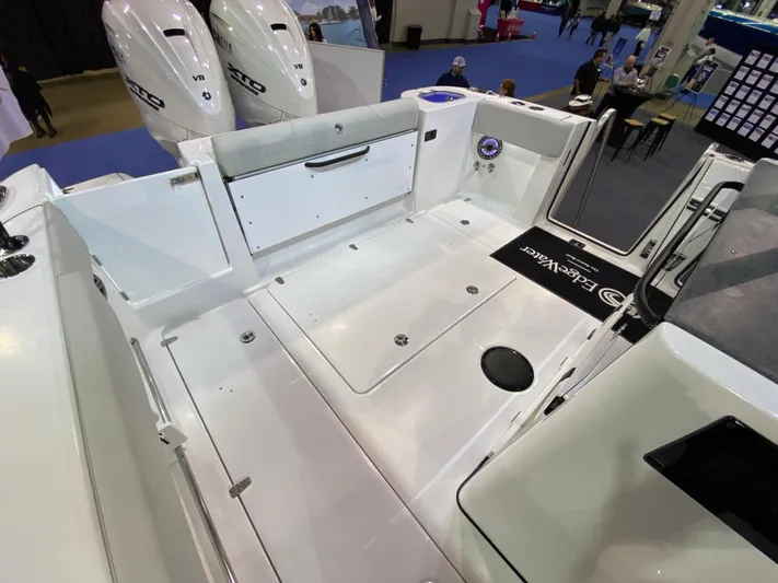  Yacht Photos Pics 2025 Edgewater 340CC boat deck with dual outboard engines, spacious layout, and modern design.