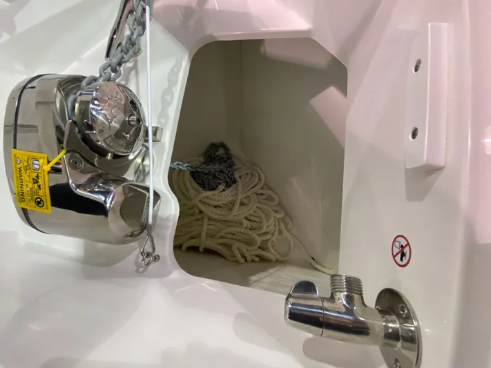  Yacht Photos Pics 2025 Edgewater 340CC anchor compartment with chain and rope storage.