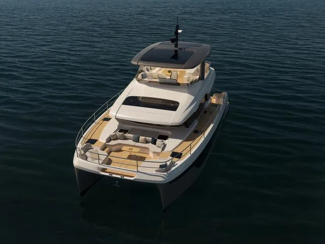 Yacht Photos Pics 2025 Fountaine Pajot VEYA YACHT V53 cruising on calm waters, showcasing sleek design and luxury.
