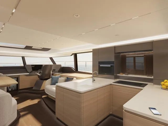  Yacht Photos Pics Luxurious interior of 2025 Fountaine Pajot VEYA YACHT V53 with modern kitchen and seating area.