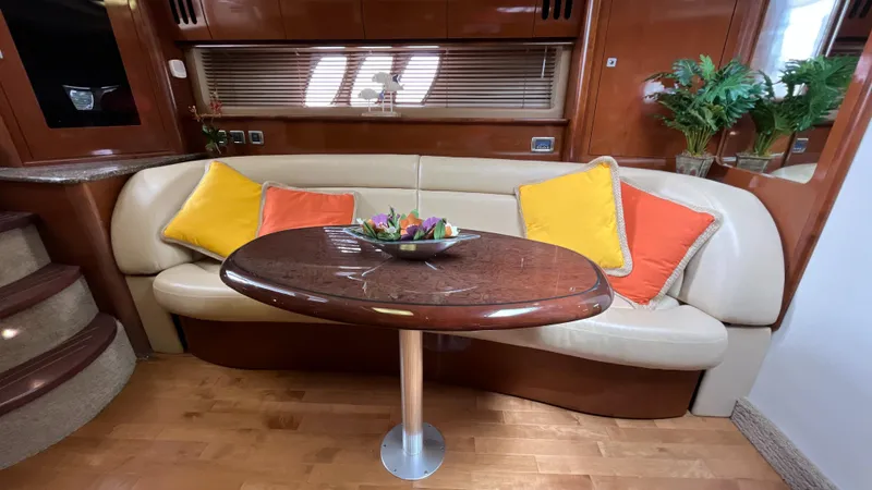 Lowest Price In Usa Yacht Photos Pics Luxurious interior of 2008 Sea Ray 44 Sundancer with elegant seating and vibrant cushions.