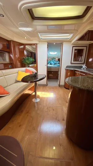 Lowest Price In Usa Yacht Photos Pics Luxurious interior of 2008 Sea Ray 44 Sundancer yacht with elegant wood finishes.
