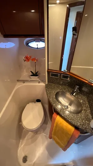 Lowest Price In Usa Yacht Photos Pics Luxurious bathroom in 2008 Sea Ray 44 Sundancer yacht with modern fixtures and elegant design.