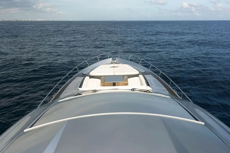 Phoenix Rising Yacht Photos Pics Front deck view of 2017 Pershing 82 VHP yacht on open sea.
