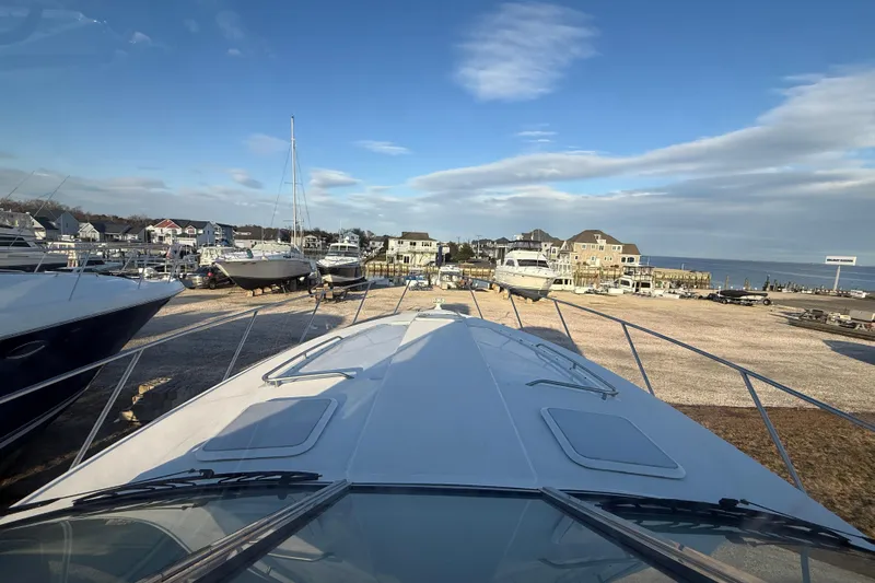  Yacht Photos Pics 2006 Formula 40 Performance Cruiser docked at a marina with scenic waterfront view.