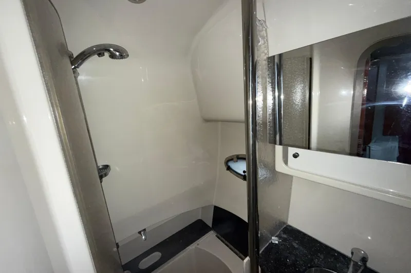  Yacht Photos Pics Bathroom interior of 2006 Formula 40 Performance Cruiser with shower and mirror.